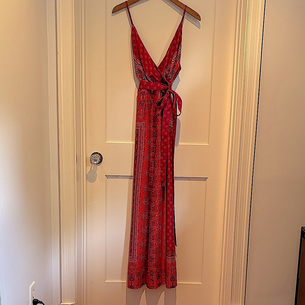 Free People silky soft spaghetti strap V Neck wide leg Cabbage Rose jumpsuit